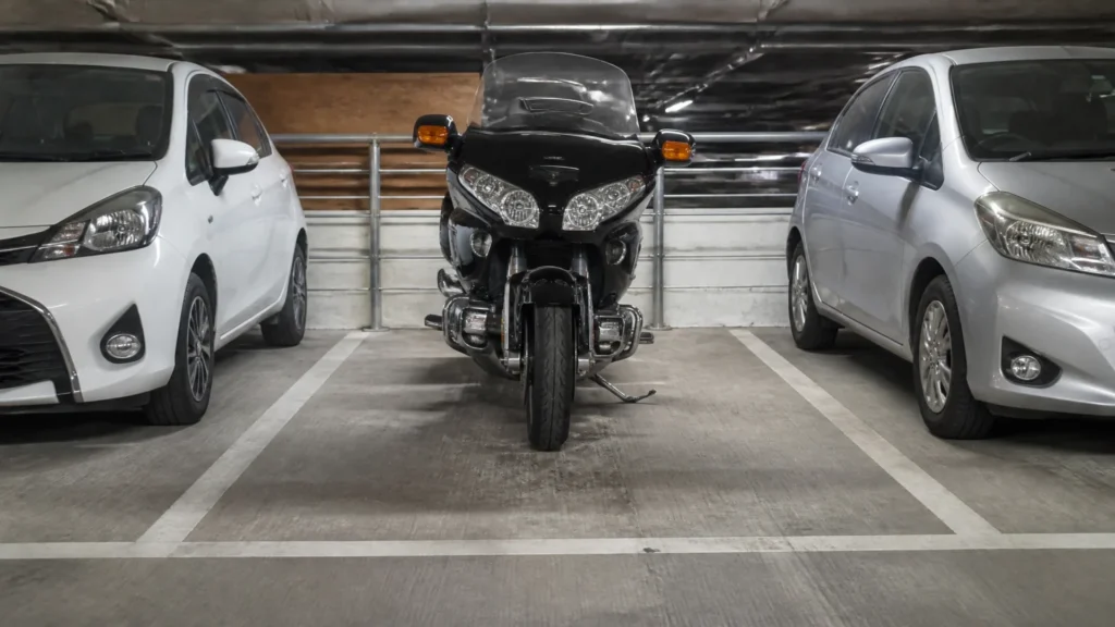 Can you park a large motorcycle in a car parking space?